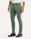 View of model wearing Duck Green Ultimate Chinos, Skinny Fit.