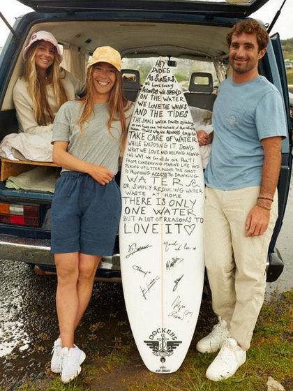 Dockers signing surf board