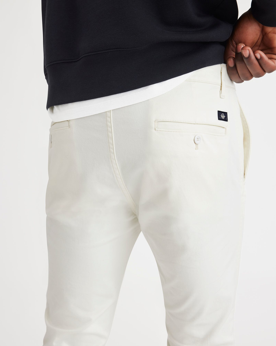 View of model wearing Egret Men's Skinny Fit Original Chino Pants.