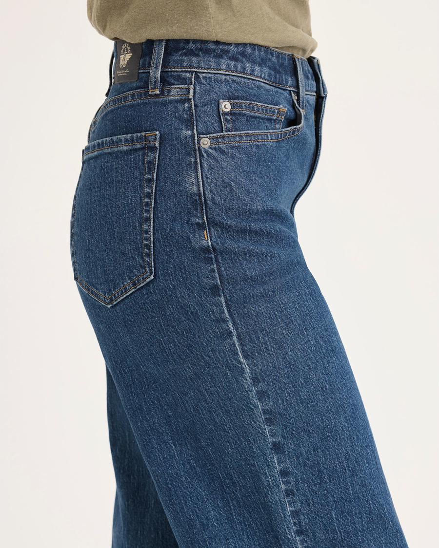 Side view of model wearing Estuary Women's High Straight Sutter Pants.