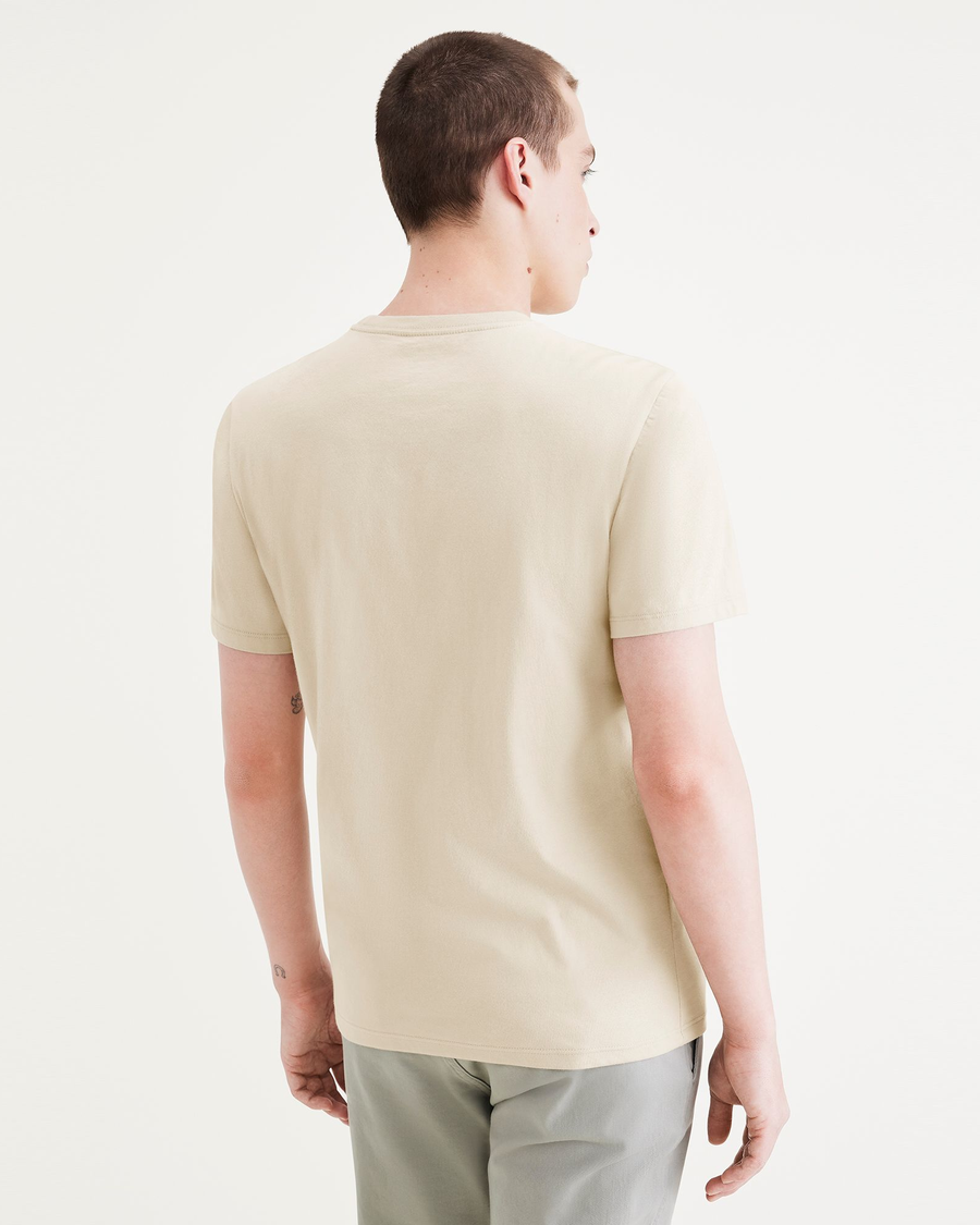 Back view of model wearing Fan Sahara Khaki (Navy Blazer) Men's Slim Fit Logo Tee.