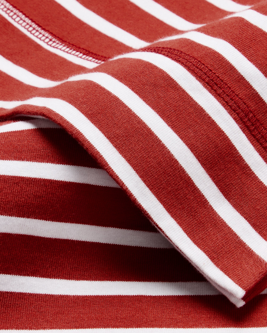 View of model wearing Fire Whirl Boatneck Tee, Regular Fit.