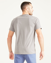 Back view of model wearing Foil Men's Slim Fit Icon Tee Shirt.