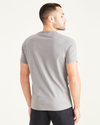 Back view of model wearing Foil Men's Slim Fit Logo Tee.