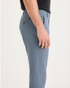 Side view of model wearing Folkstone Gray Ultimate Chino Pants with Smart 360 Flex™, Skinny Fit.