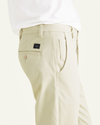 View of model wearing Gray Breeze Men's Skinny Fit Supreme Flex Alpha Khaki Pants.