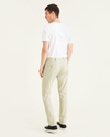 Back view of model wearing Gray Breeze Men's Skinny Fit Supreme Flex Alpha Khaki Pants.