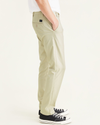 Side view of model wearing Gray Breeze Men's Skinny Fit Supreme Flex Alpha Khaki Pants.