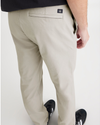 View of model wearing Grit Alpha Chino Pants, Slim Fit.