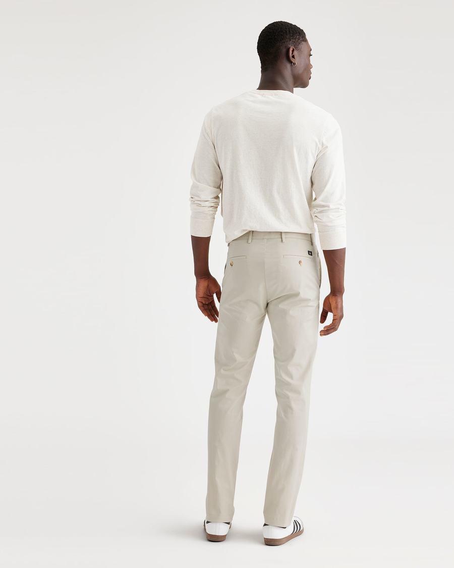 Back view of model wearing Grit Crafted Khaki Pants, Slim Fit.