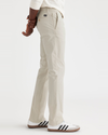 Side view of model wearing Grit Crafted Khaki Pants, Slim Fit.