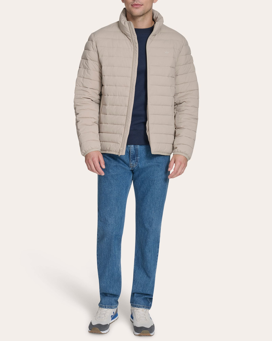 View of model wearing Grit Men's Packable Jacket.