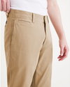 View of model wearing Harvest Gold Alpha Chino Pants, Slim Fit.