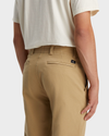 View of model wearing Harvest Gold Alpha Chino Pants, Straight Fit.