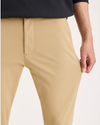 View of model wearing Harvest Gold Chino Go Activeflex, fit skinny.