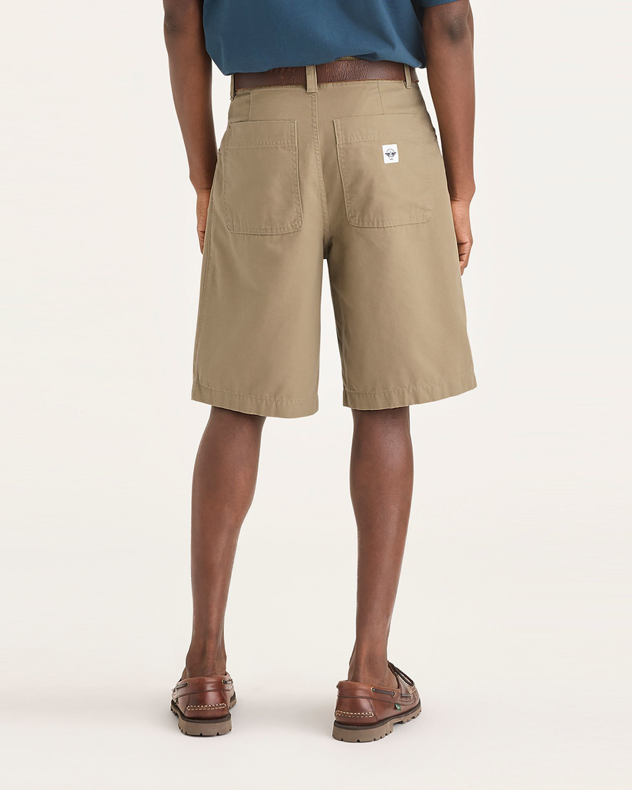 Back view of model wearing Harvest Gold Men's Loose Fit Eighty-Six Dock 10" Shorts.