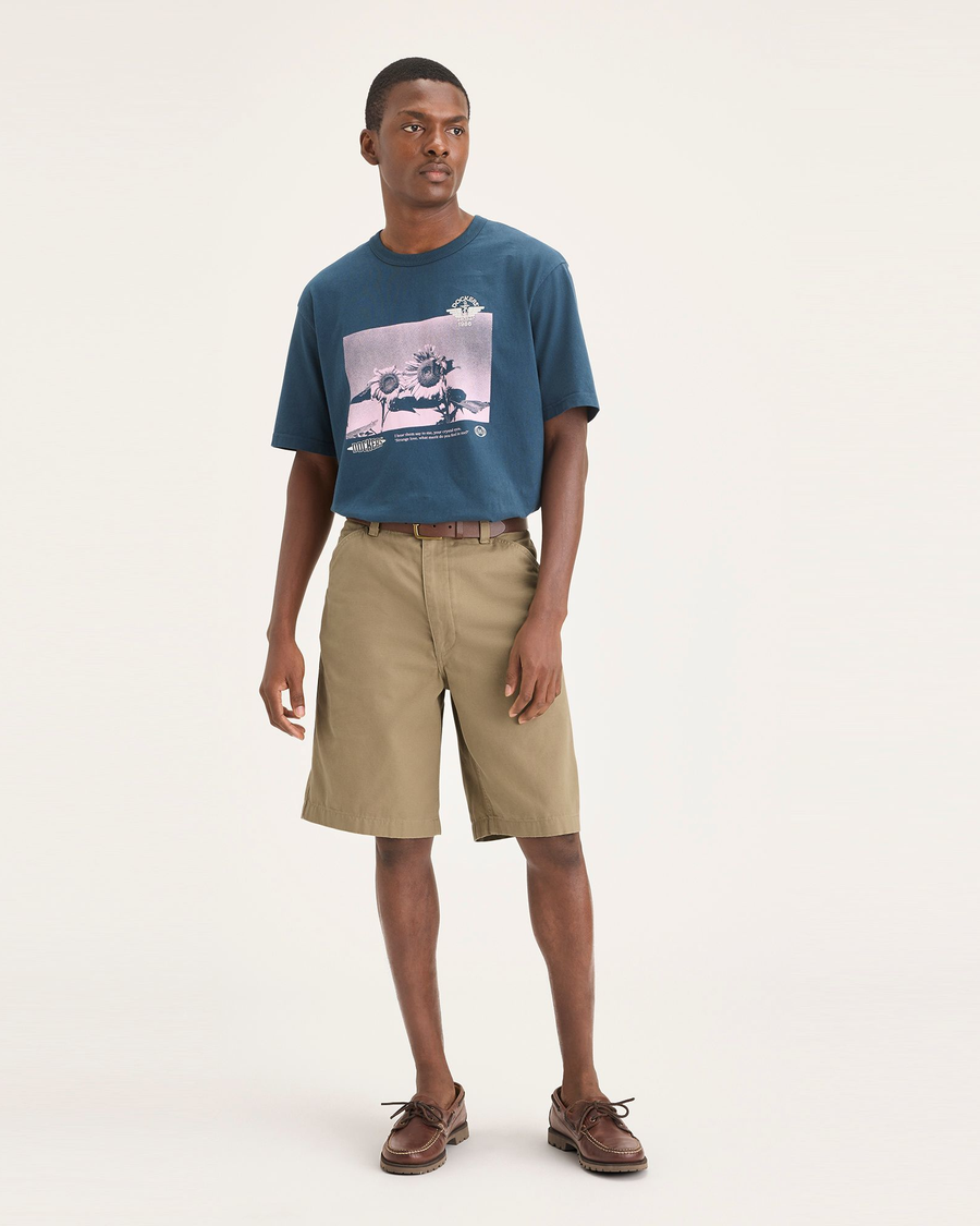 Front view of model wearing Harvest Gold Men's Loose Fit Eighty-Six Dock 10" Shorts.