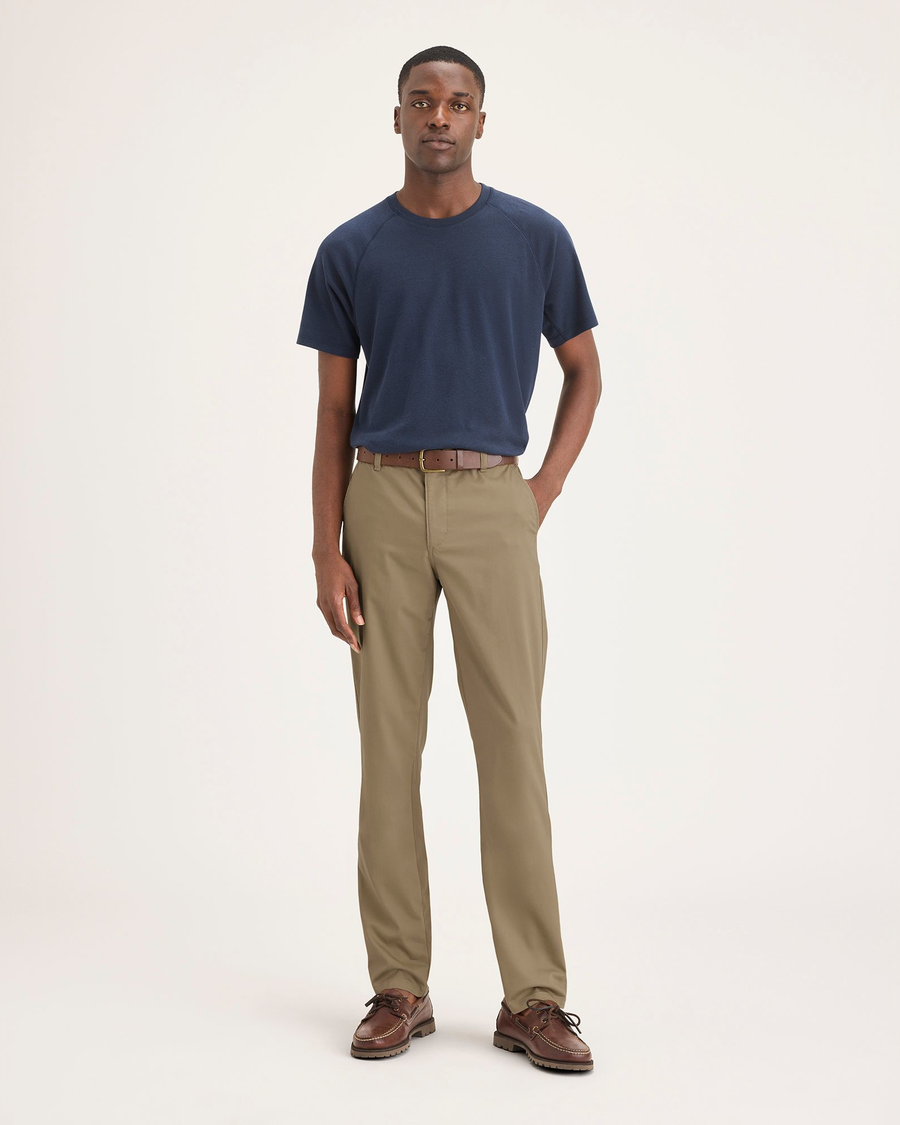 Front view of model wearing Harvest Gold Men's Slim Fit Smart 360 Flex Ultimate Chino Pants.