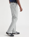 Side view of model wearing High-Rise Crafted Khaki Pants, Slim Fit.