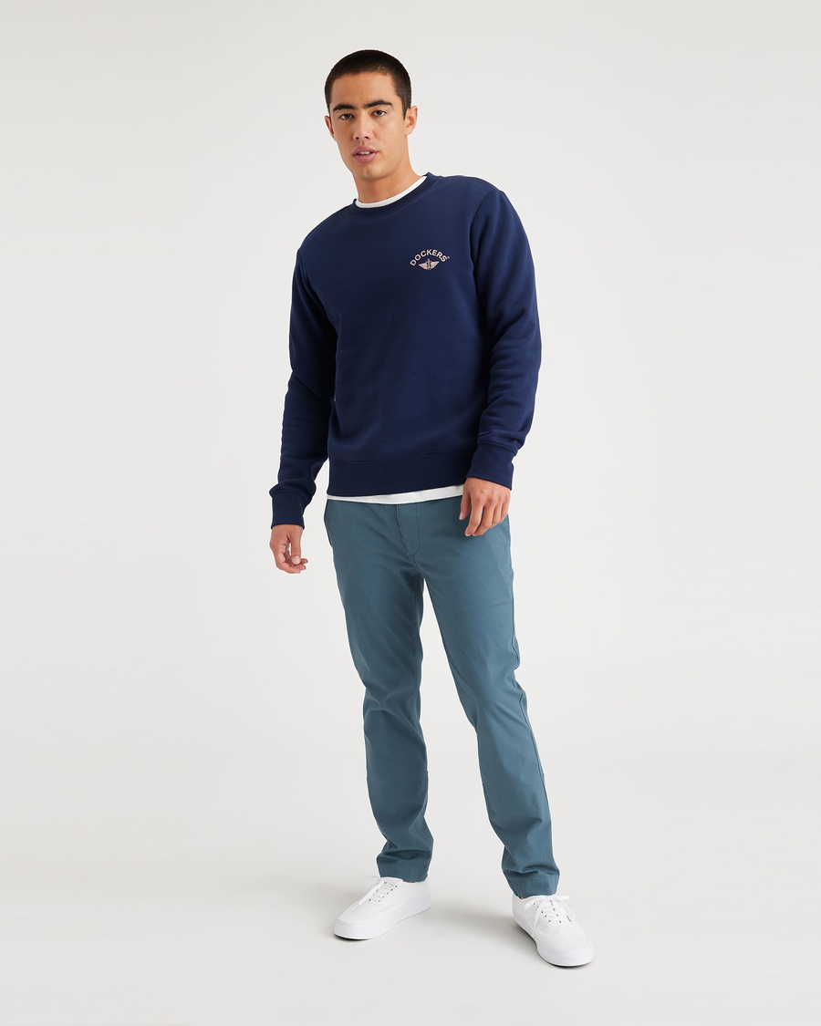 View of model wearing Indian Teal Alpha Chino Pants, Skinny Fit.