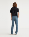 Back view of model wearing Indian Teal Crafted Khaki Pants, Slim Fit.