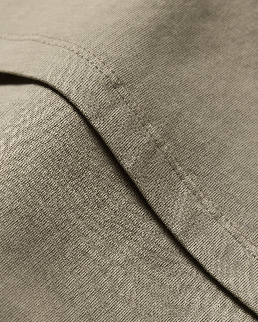 View of model wearing Lemon Pepper Graphic Tee, Slim Fit.