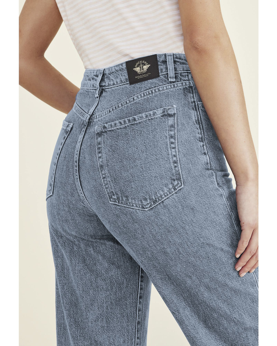 View of model wearing Light Indigo Worn In Women's Straight Fit High Jean Cut Pants.