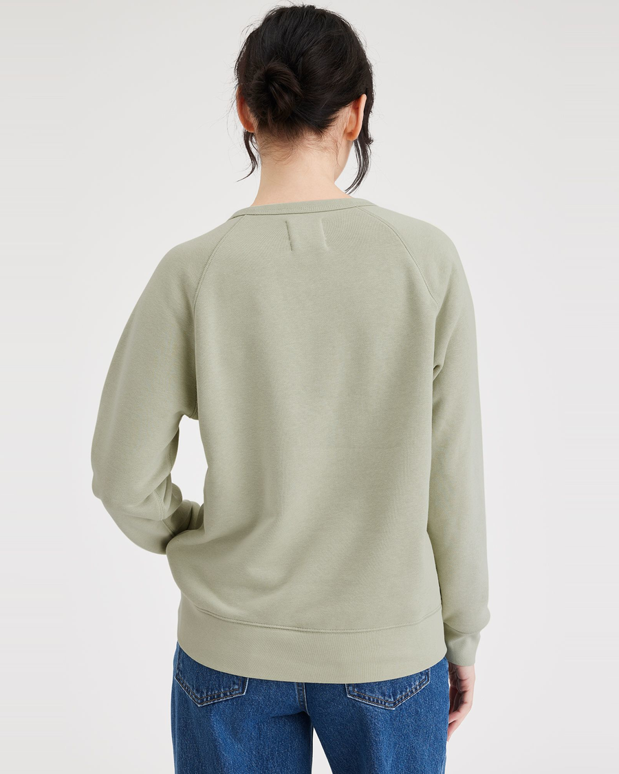 Back view of model wearing Lint Women's Classic Fit Icon Sweatshirt.