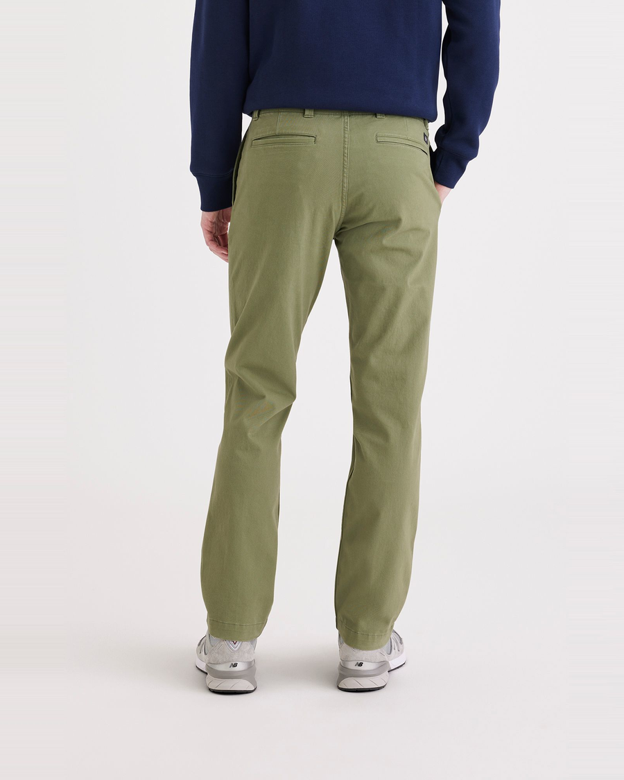 Back view of model wearing Loden Green Men's Slim Fit Smart 360 Flex California Chino Pants.