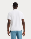Back view of model wearing Lucent White Go Polo, Regular Fit.
