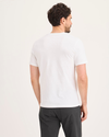 Back view of model wearing Lucent White Graphic Tee, Slim Fit.