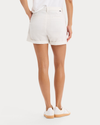 Back view of model wearing Lucent White Original Chino Shorts.