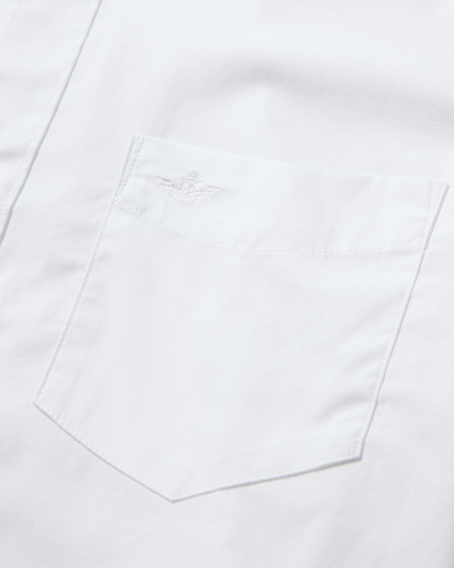 View of model wearing Lucent White Signature Shirt Long Sleeve with Stain Defender®, Slim Fit.