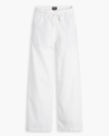 View of model wearing Lucent White Women's Drawstring Pants.