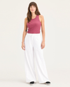 Front view of model wearing Lucent White Women's Drawstring Pants.