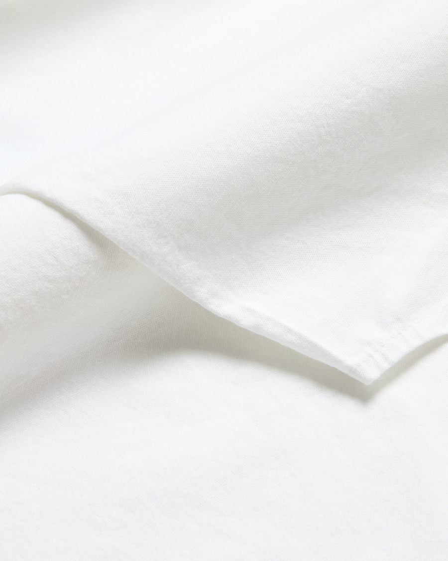 View of model wearing Lucent White Women's Shirt, Relaxed Fit.