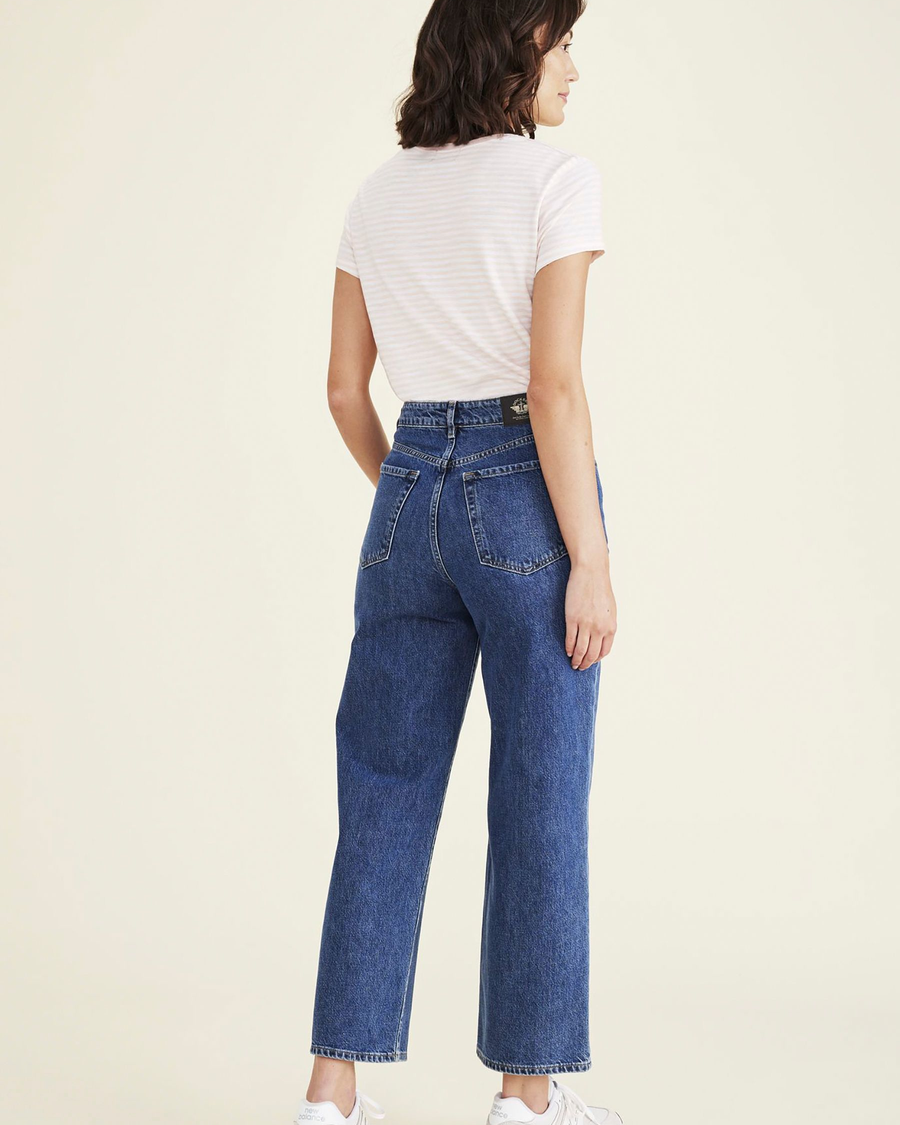 Back view of model wearing Medium Indigo Stonewash Women's Straight Fit High Jean Cut Pants.