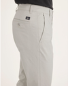 Side view of model wearing Moonstruck Men's Skinny Fit Original Chino Pants.