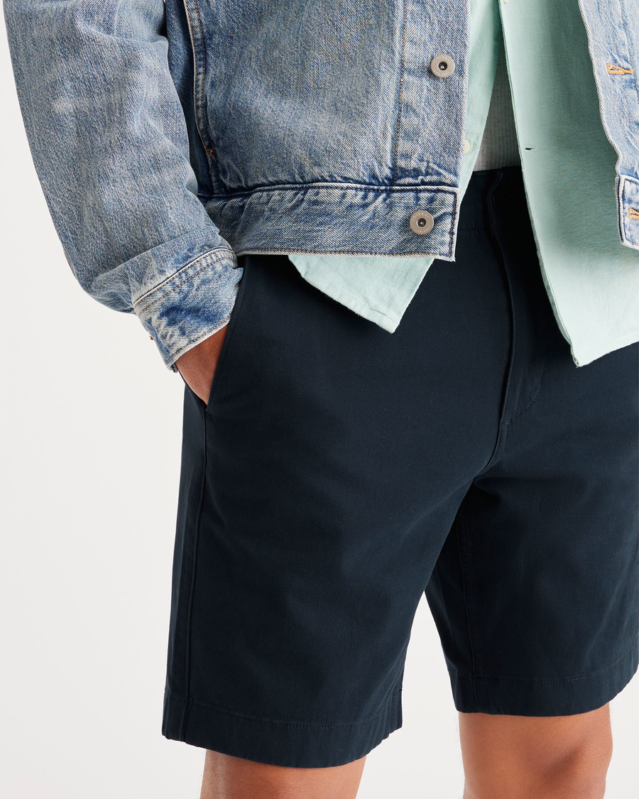 View of model wearing Navy Blazer Alpha Chino Shorts, Straight Fit.