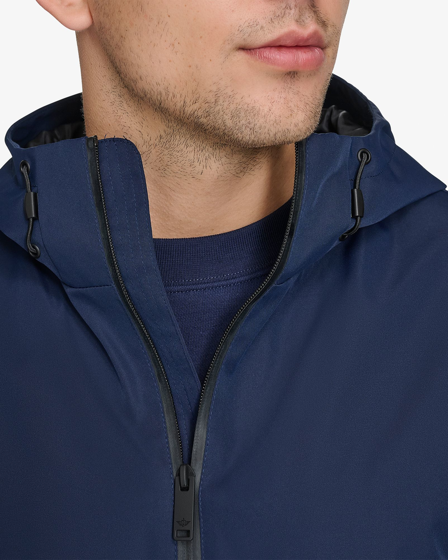 View of model wearing Navy Blazer Men's Flex Tech Hoodie Jacket.