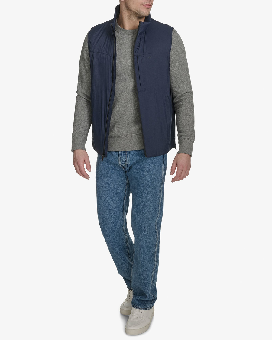 View of model wearing Navy Blazer Men's Lightweight Padded Vest.