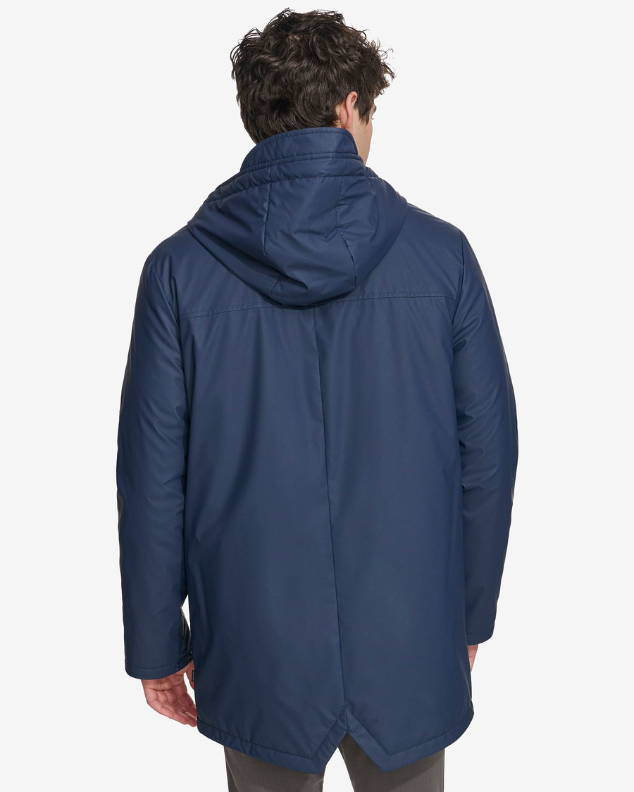Back view of model wearing Navy Blazer Men's Lightweight Rain Jacket.