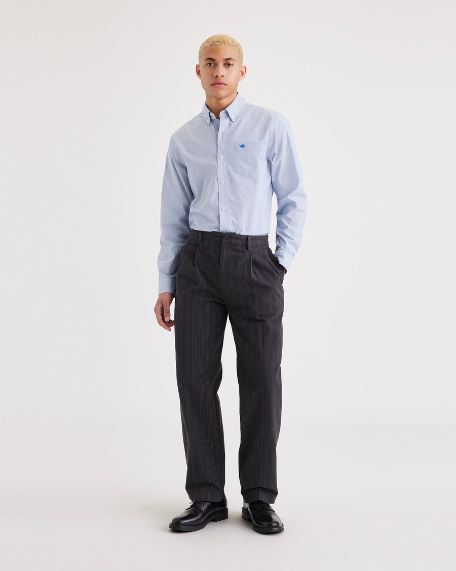 Front view of model wearing Navy Blazer Men's Loose Fit Pleated Original Chino Pants.