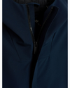 View of model wearing Navy Blazer Men's Performance Welded Modern Parka Jacket.