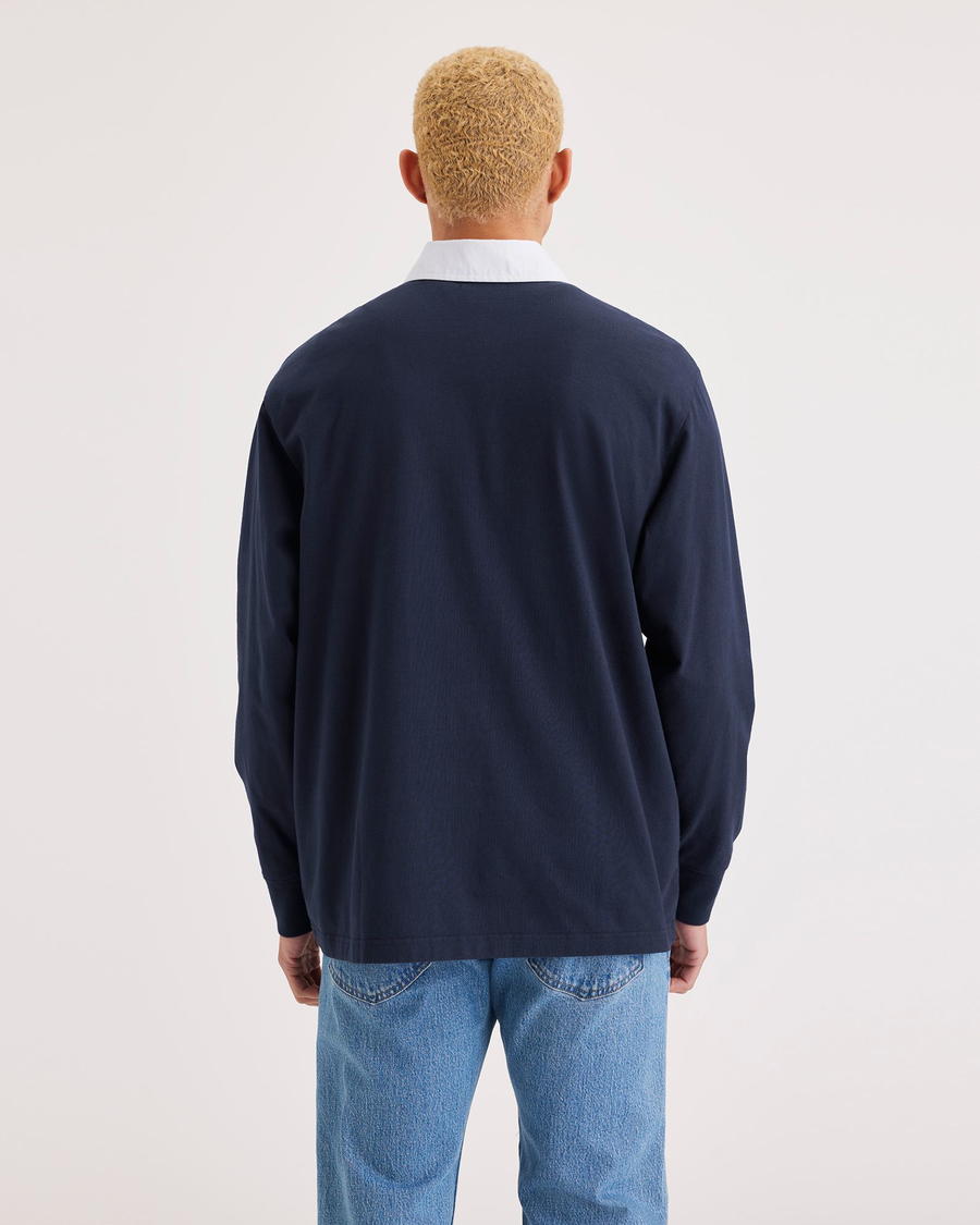 Back view of model wearing Navy Blazer Men's Relaxed Fit Rugby Shirt.