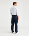 Back view of model wearing Navy Blazer Men's Slim Fit Smart 360 Flex Workday Khaki Pants.