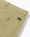 View of model wearing New British Khaki Essential Chino Pants, Skinny Fit.