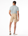 Back view of model wearing New British Khaki Men's Straight Fit Ultimate Shorts.