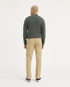 Back view of model wearing New British Khaki Ultimate Chinos, Slim Fit.