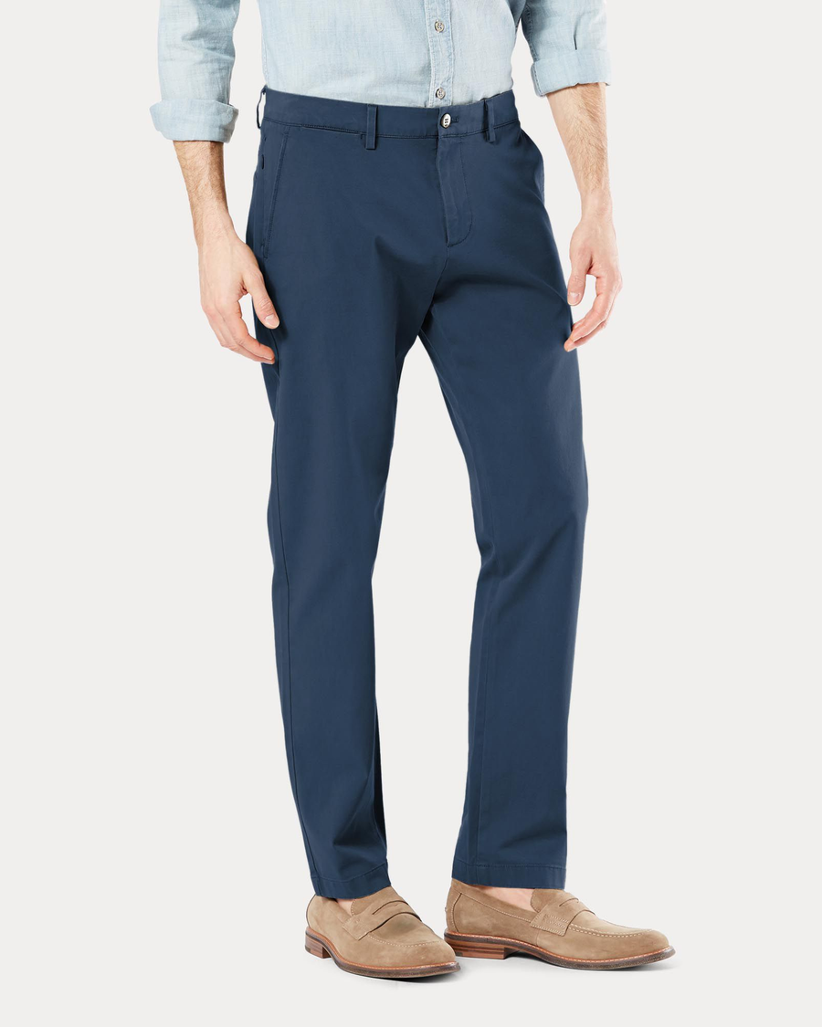 Side view of model wearing Ocean Blue Crafted Khaki Pants, Slim Tapered Fit.